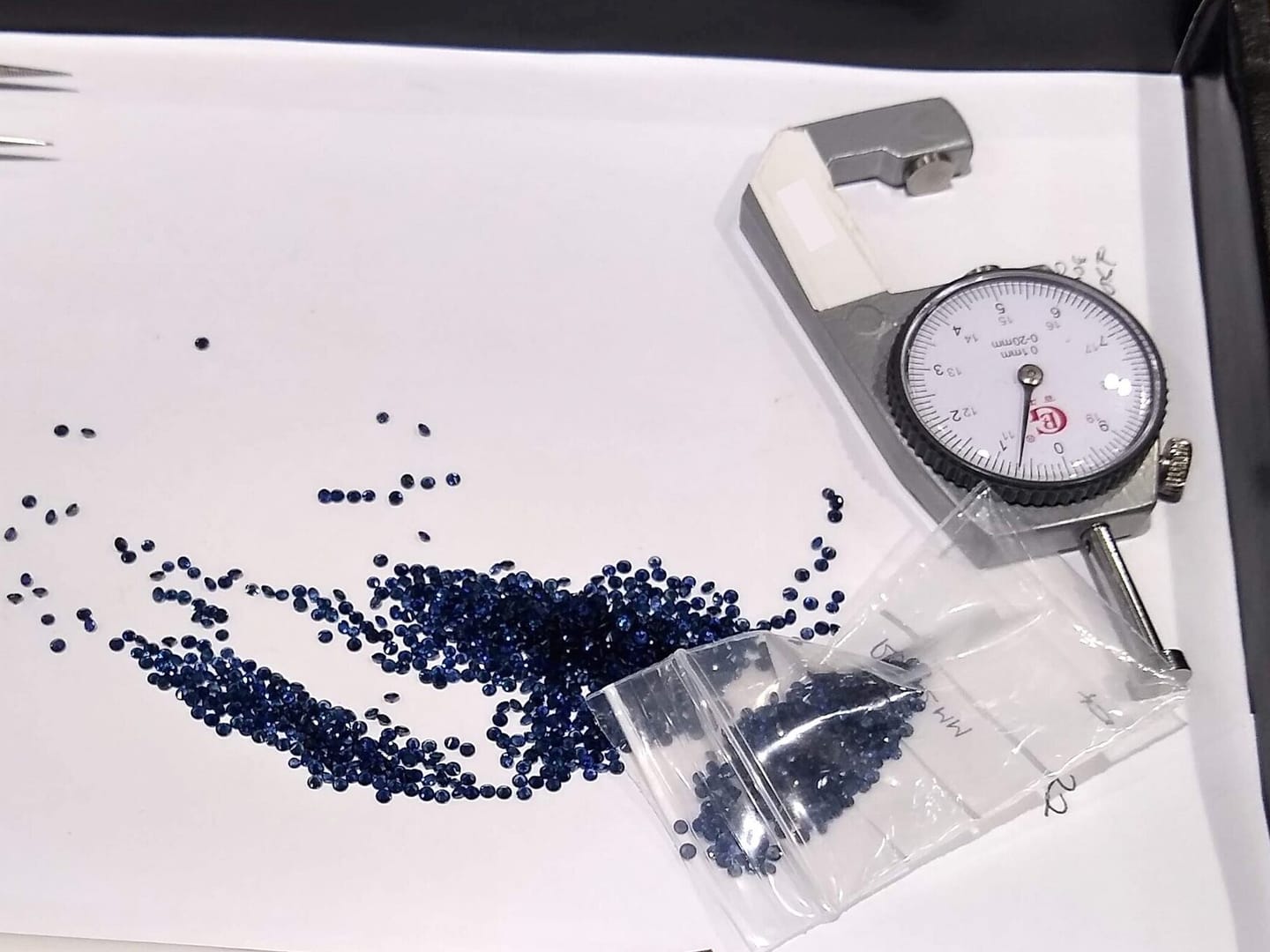 Blue sapphire catalogue study: Sapphires in a gemstones store.