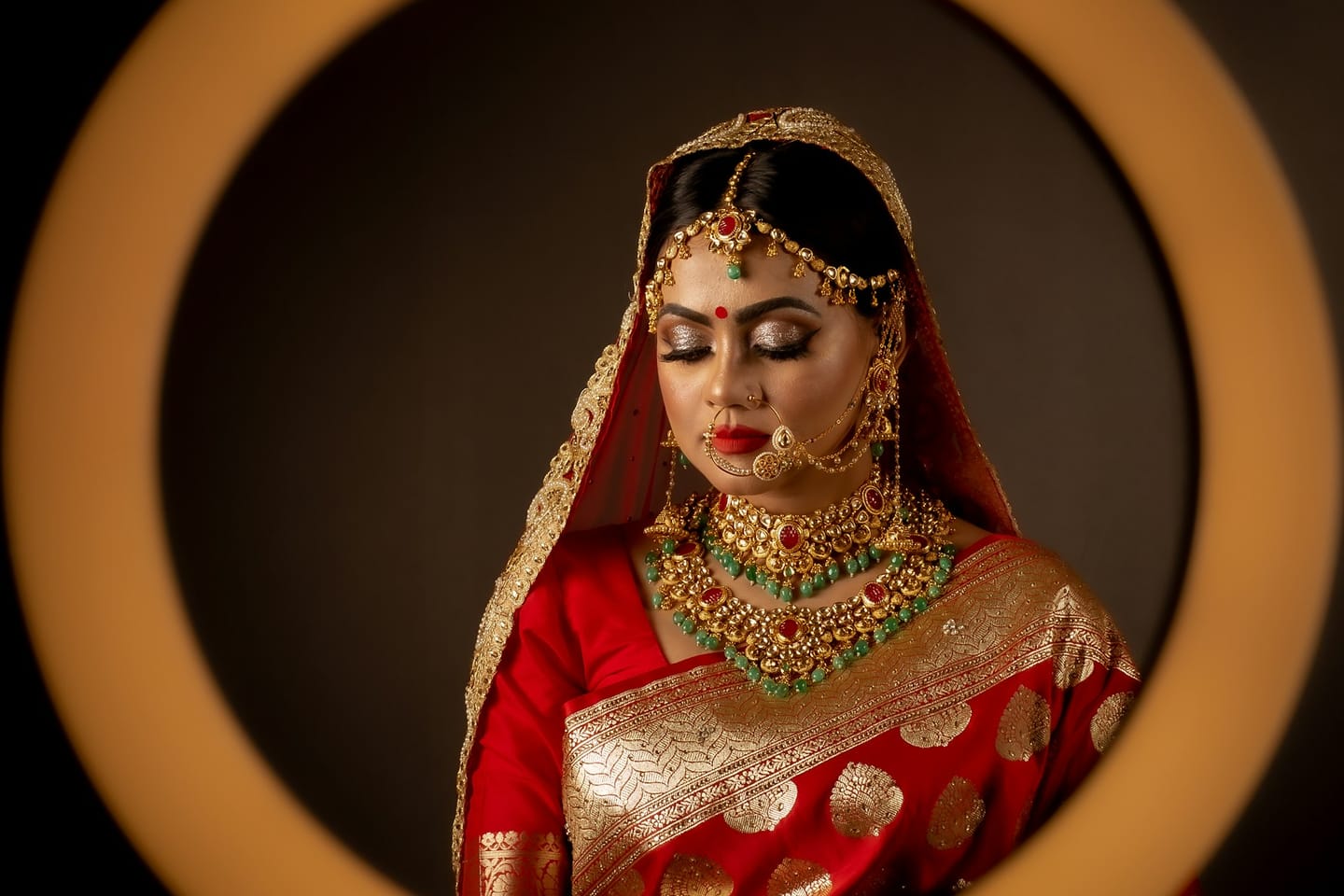 Woman in red and gold dress.